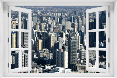 Fototapeta Naklejka Na Ścianę Okno 3D - Aerial view of contemporary modern building in Bangkok cityscape