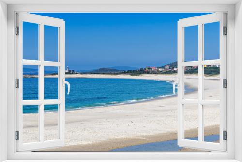 Fototapeta Naklejka Na Ścianę Okno 3D - Pristine white sandy beach and blue ocean in Muros, Galicia, Spain.