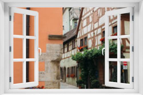 Fototapeta Naklejka Na Ścianę Okno 3D - Rothenburg ob der Tauber, Germany 25 June 2018: Old Town of Rothenburg ob der Tauber, Germany