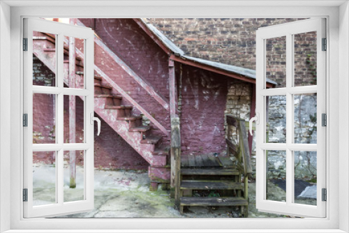 Fototapeta Naklejka Na Ścianę Okno 3D - Old staircase falling apart