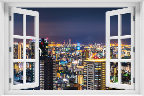 Fototapeta Naklejka Na Ścianę Okno 3D - OSAKA, JAPAN-SEPTEMBER 2, 2018,High angle Night view of Osaka,Japan,on Umeda Sky Building,long exposure photograph
