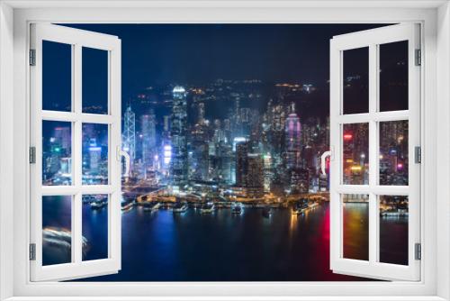 Fototapeta Naklejka Na Ścianę Okno 3D - Commercial Building With Water Reflection In Victoria Harbor At Night On October 8, 2018