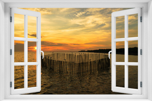 Fototapeta Naklejka Na Ścianę Okno 3D - Sunset at sea Bangpu Recreation Center