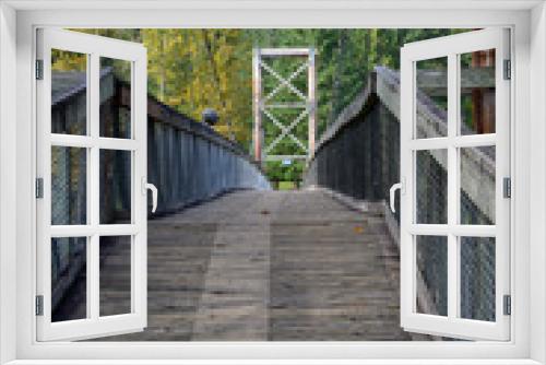 Fototapeta Naklejka Na Ścianę Okno 3D - Vanishing point wood suspension bridge