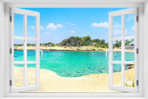 Fototapeta Naklejka Na Ścianę Okno 3D - A view of a azzure water and Nissi beach in Aiya Napa, Cyprus