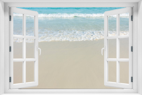 Fototapeta Naklejka Na Ścianę Okno 3D - Soft blue ocean wave on sandy beach