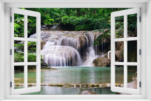Fototapeta Naklejka Na Ścianę Okno 3D - The stunning and beautiful Erawan waterfalls near Kanchanaburi located a little north west of Bangkok in Thailand. 