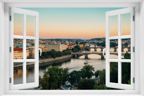 Prague city old buildings and Vltava river with sunset from Letna park in Prague, Czech