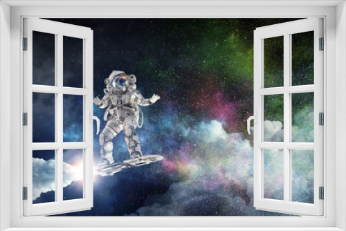Fototapeta Naklejka Na Ścianę Okno 3D - Spaceman on flying board. Mixed media
