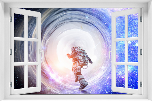 Fototapeta Naklejka Na Ścianę Okno 3D - Running spaceman and galaxy. Mixed media
