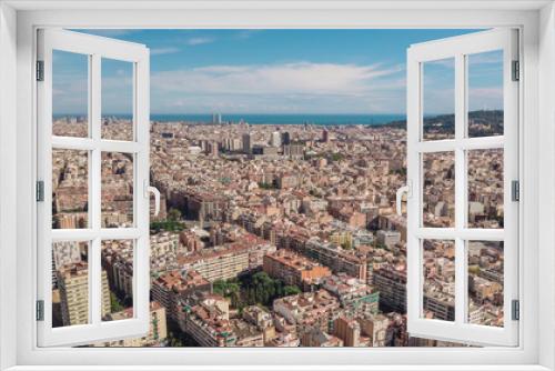 Cityscape of Barcelona at sunny day. Aerial view