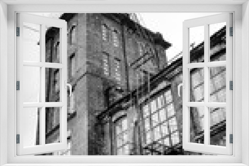 Fototapeta Naklejka Na Ścianę Okno 3D - black and white, Old factory brick exterior removated