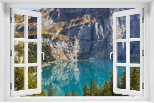 Fototapeta Naklejka Na Ścianę Okno 3D - Wandern im Berner Oberland mit Blick auf die Schweizer Alpen und einen Bergsee – Oeschinensee, Kanton Bern, Schweiz