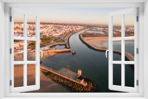 Fototapeta Naklejka Na Ścianę Okno 3D - Aerial view of beautiful cliffs and beach near Lagos, Algarve, Portugal at sunrise