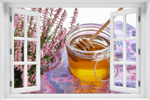 Fototapeta Naklejka Na Ścianę Okno 3D - Honey in jar with fresh heather on wooden background