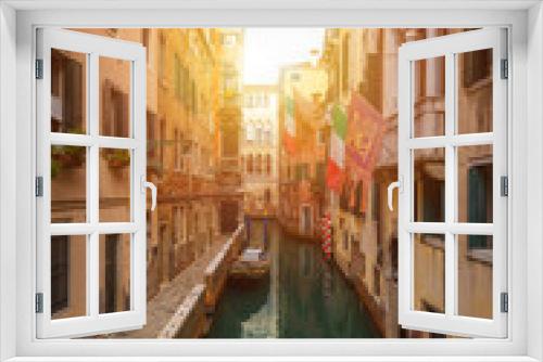 Fototapeta Naklejka Na Ścianę Okno 3D - View of the street canal in Venice, Italy. Colorful facades of old Venice houses. Venice is a popular tourist destination of Europe. Venice, Italy.