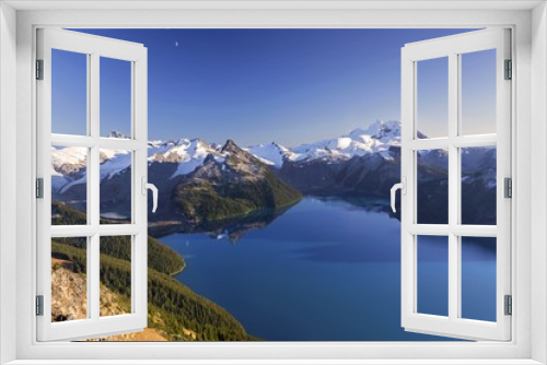 Fototapeta Naklejka Na Ścianę Okno 3D - Scenic Landscape View of Blue Garibaldi Lake and Snow Covered Coast Mountains from Panorama Ridge in Sea to Sky Corridor between Squamish and Whistler, British Columbia Canada