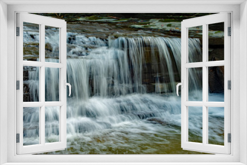 Fototapeta Naklejka Na Ścianę Okno 3D - Waterfall cascading over the rocks near Finger lake trail