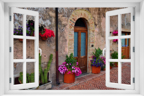 Fototapeta Naklejka Na Ścianę Okno 3D - Old house in Tuscany with flowers