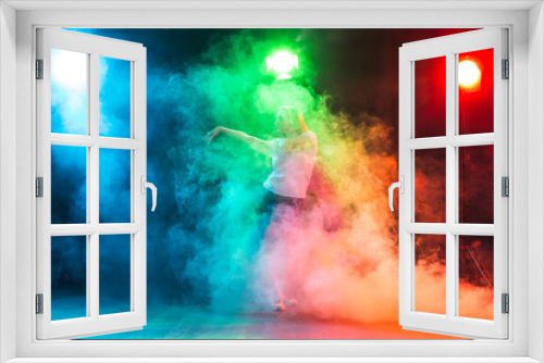 Fototapeta Naklejka Na Ścianę Okno 3D - Modern dance concept - Cheerleading young woman dancing on coloured background