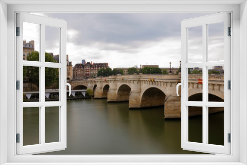 Fototapeta Naklejka Na Ścianę Okno 3D - Paris, France - May 25, 2018: Pont Neuf in central Paris. The Pont Neuf is the oldest standing bridge across the river Seine in Paris