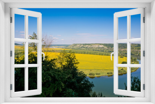 Fototapeta Naklejka Na Ścianę Okno 3D - Beautiful view of nature. Blue sky, yelow field.