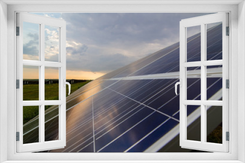 Fototapeta Naklejka Na Ścianę Okno 3D - Solar panels closeup on sunset background