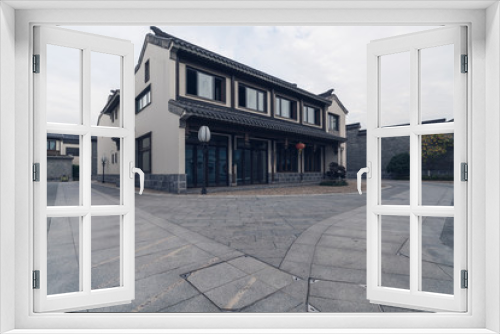 Fototapeta Naklejka Na Ścianę Okno 3D - Empty road near vintage building in Nanjing