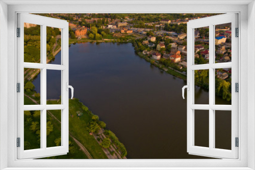 Fototapeta Naklejka Na Ścianę Okno 3D - Aerial view of the summer city park near the lake. Beautiful view of nature.