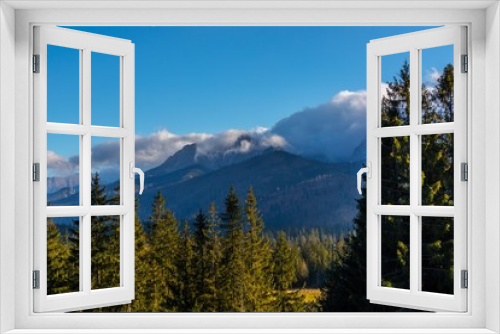 Fototapeta Naklejka Na Ścianę Okno 3D - Giewont  w chmurach 