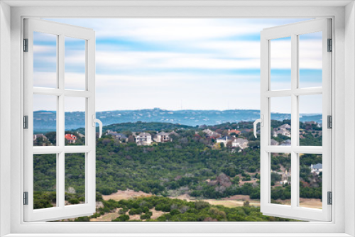 Sunrise over beautiful hillside homes in Austin, Texas