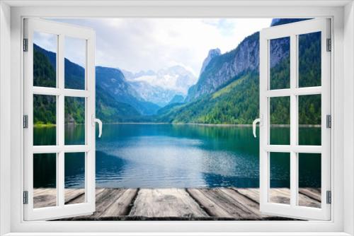 Fototapeta Naklejka Na Ścianę Okno 3D - Wooden empty table and mountains with lake landscape background
