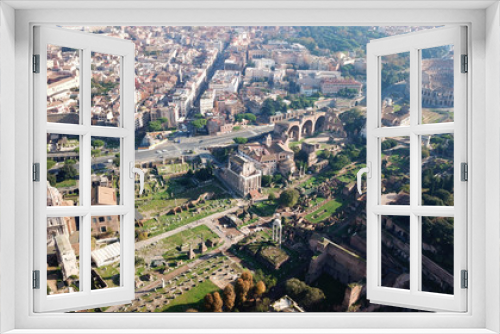 Fototapeta Naklejka Na Ścianę Okno 3D - Aerial drone view from Roman Forum one of the main tourist attractions which was build in ancient times as the site of triumphal processions and elections next to Colosseum, Rome, Italy