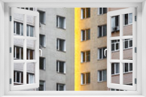 Fototapeta Naklejka Na Ścianę Okno 3D - windows of a modern building with orange walls