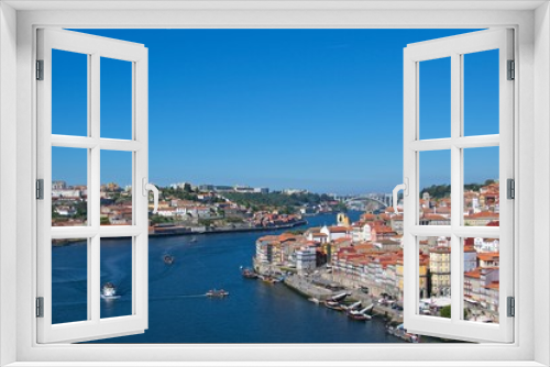 Fototapeta Naklejka Na Ścianę Okno 3D - View of old Porto with bridge over Douro River in Portugal