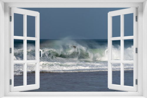 Fototapeta Naklejka Na Ścianę Okno 3D - Surfer on Atlantic ocean wave , Nazare , Portugal.