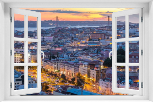 Fototapeta Naklejka Na Ścianę Okno 3D - Lisbon after sunset aerial panorama view of city centre with red roofs at Autumn day to night timelapse, Portugal
