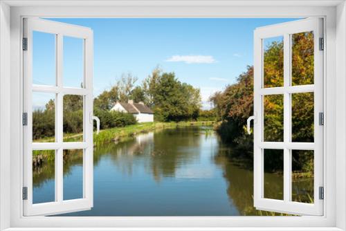 Fototapeta Naklejka Na Ścianę Okno 3D - Summer canal cottage background