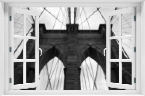 Fototapeta Naklejka Na Ścianę Okno 3D - Black and white upward view of Brooklyn Bridge