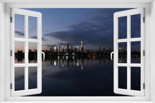 Fototapeta Naklejka Na Ścianę Okno 3D - Modern city skyline behind lake
