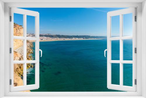 Fototapeta Naklejka Na Ścianę Okno 3D - Scenic view of surf beach and ocean near Nazare Portugal