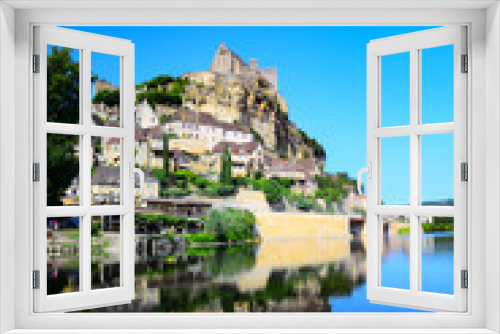 Fototapeta Naklejka Na Ścianę Okno 3D - The medieval fortress and village of Beynac as seen from the Dordogne River in Aquitaine, France