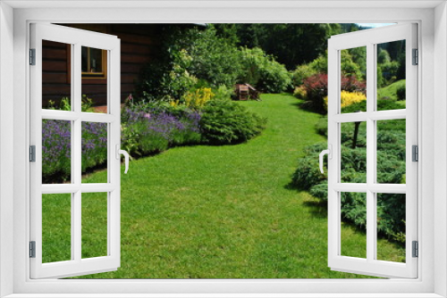 Fototapeta Naklejka Na Ścianę Okno 3D - Kwitnący ogród