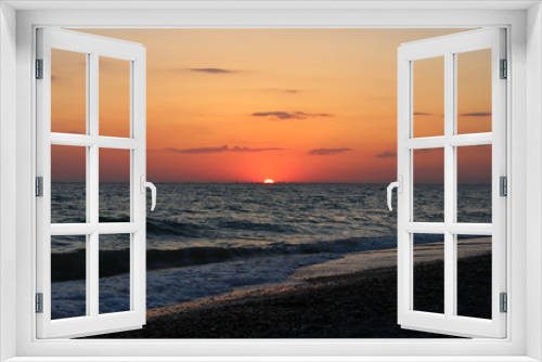 Fototapeta Naklejka Na Ścianę Okno 3D - Seascape as a background, beautiful sunset over the sea, pebble beach, vacation, vacation.