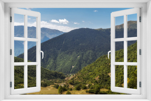 Fototapeta Naklejka Na Ścianę Okno 3D - View to a valley from high in mountains