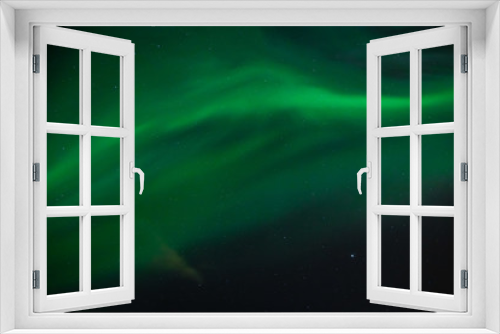 Fototapeta Naklejka Na Ścianę Okno 3D - Green Aurora Borealis on night sky.