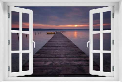Fototapeta Naklejka Na Ścianę Okno 3D - Seascape during sunset. Beautiful natural seascape, blue hour. Sea sunset at a lake coast near Varna, Bulgaria. Magnificent sunset with clouds in the middle of February.