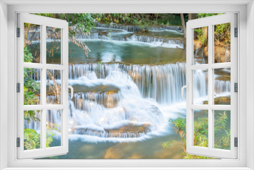 Fototapeta Naklejka Na Ścianę Okno 3D - Waterfall flowing from the mountains at Huay Mae khamin waterfall National Park ,Kanchana buri in Thailand.