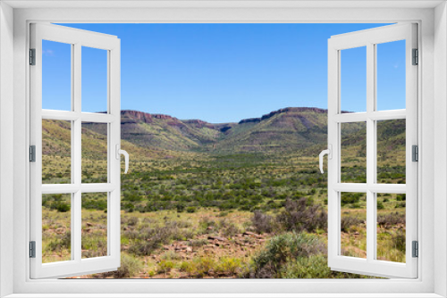 Fototapeta Naklejka Na Ścianę Okno 3D - The arid landscape of the Karoo National Park in South Africa.