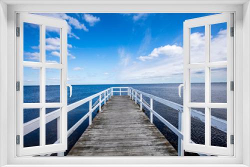 Fototapeta Naklejka Na Ścianę Okno 3D - wooden pier on the blue sea